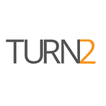 TURN2 logo